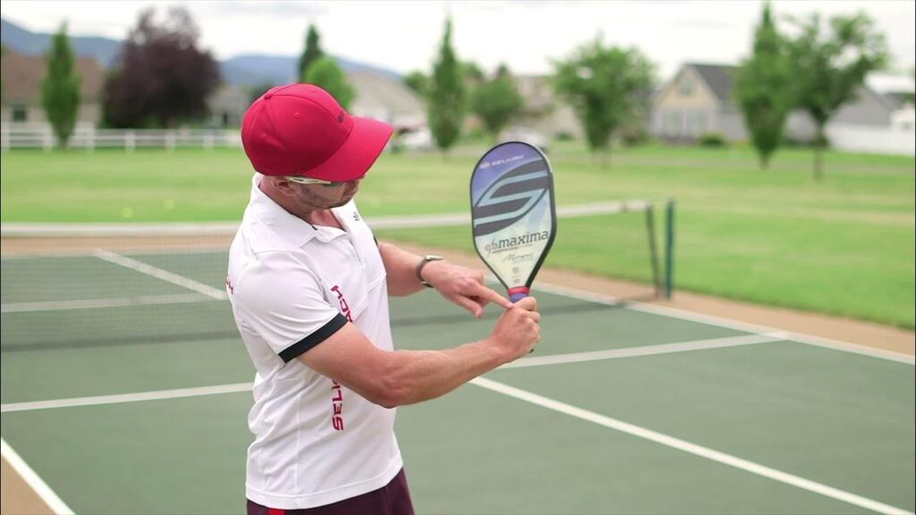 pickleball player holding paddle